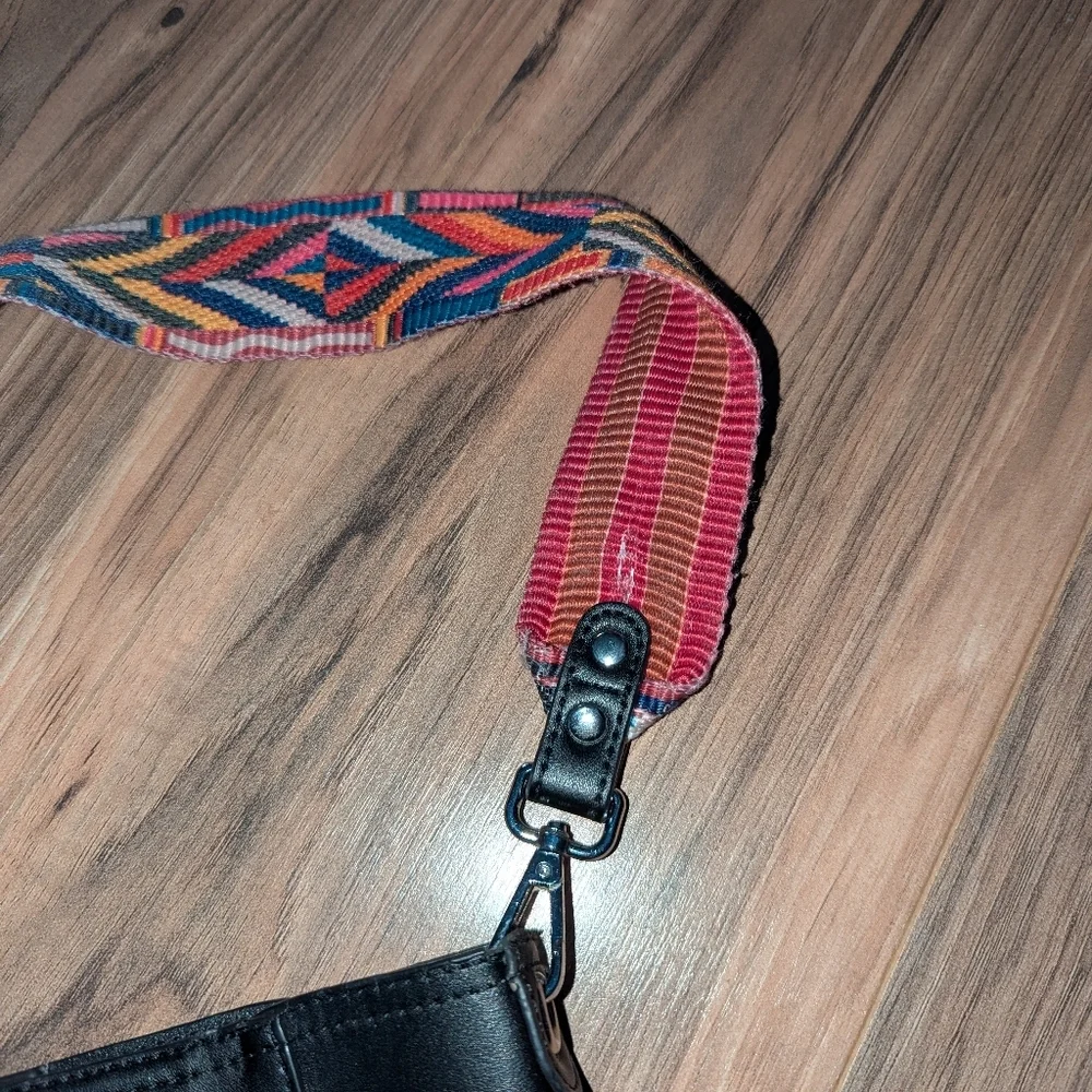 Black leather Bromen back with boho style shoulder strap.
